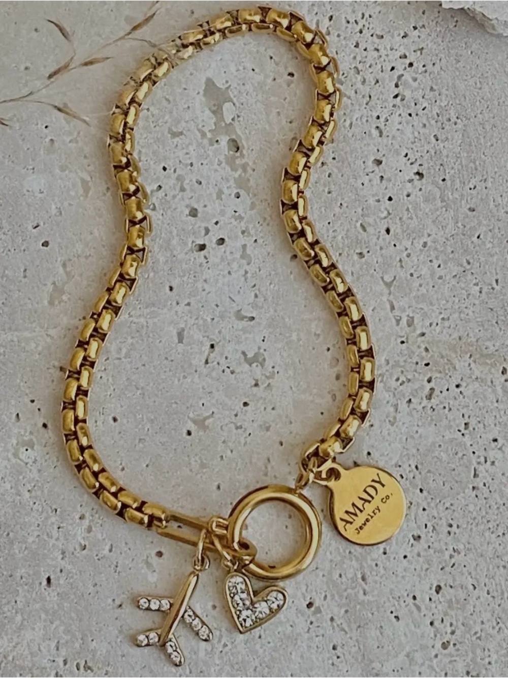 Gold Tone traveler Charm Bracelet with Crystal plane and Heart Charms